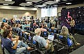 Talk in the exhibition area of the IAU XXIX General Assembly