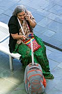 Woman on the phone at IAU XXIX General Assembly
